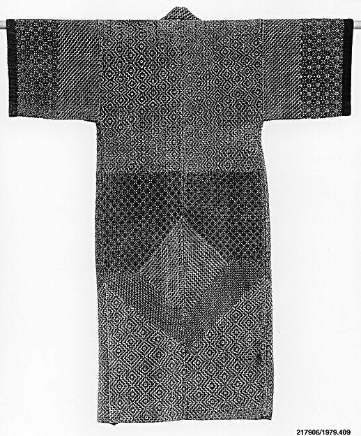 A mid-19th-century Japanese sashiko kimono patterned in white running stitch on indigo